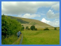 On the way to Pendle Hill. The diagonal path to the top can be seen in the distance .